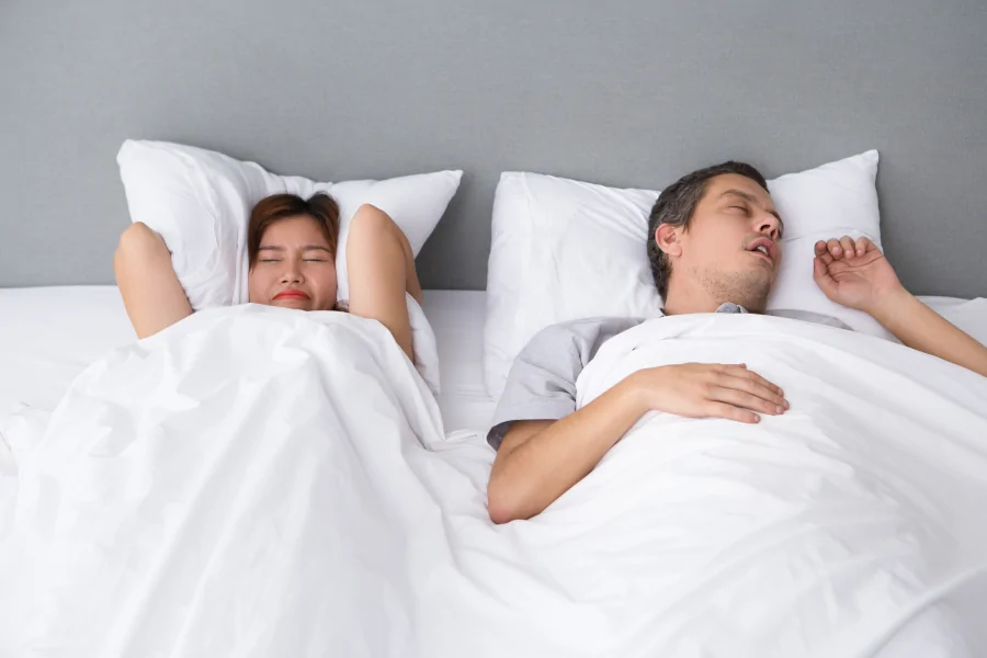 How to sleep with a snorer